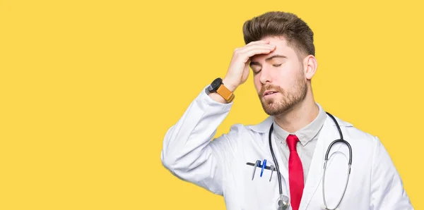 Young Handsome Doctor Man Wearing Medical Coat Touching Forehead Illness — Stock Photo, Image