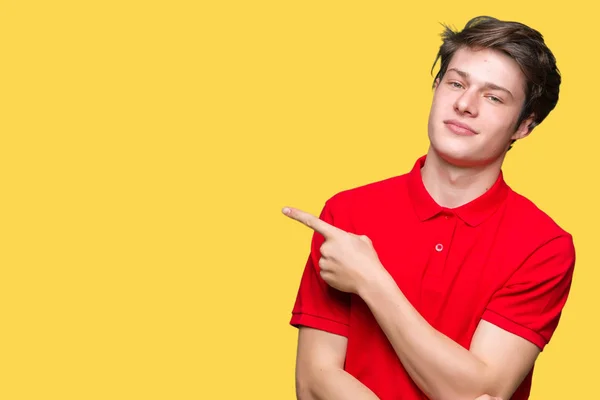 Jovem Homem Bonito Vestindo Camiseta Vermelha Sobre Fundo Isolado Apontando — Fotografia de Stock