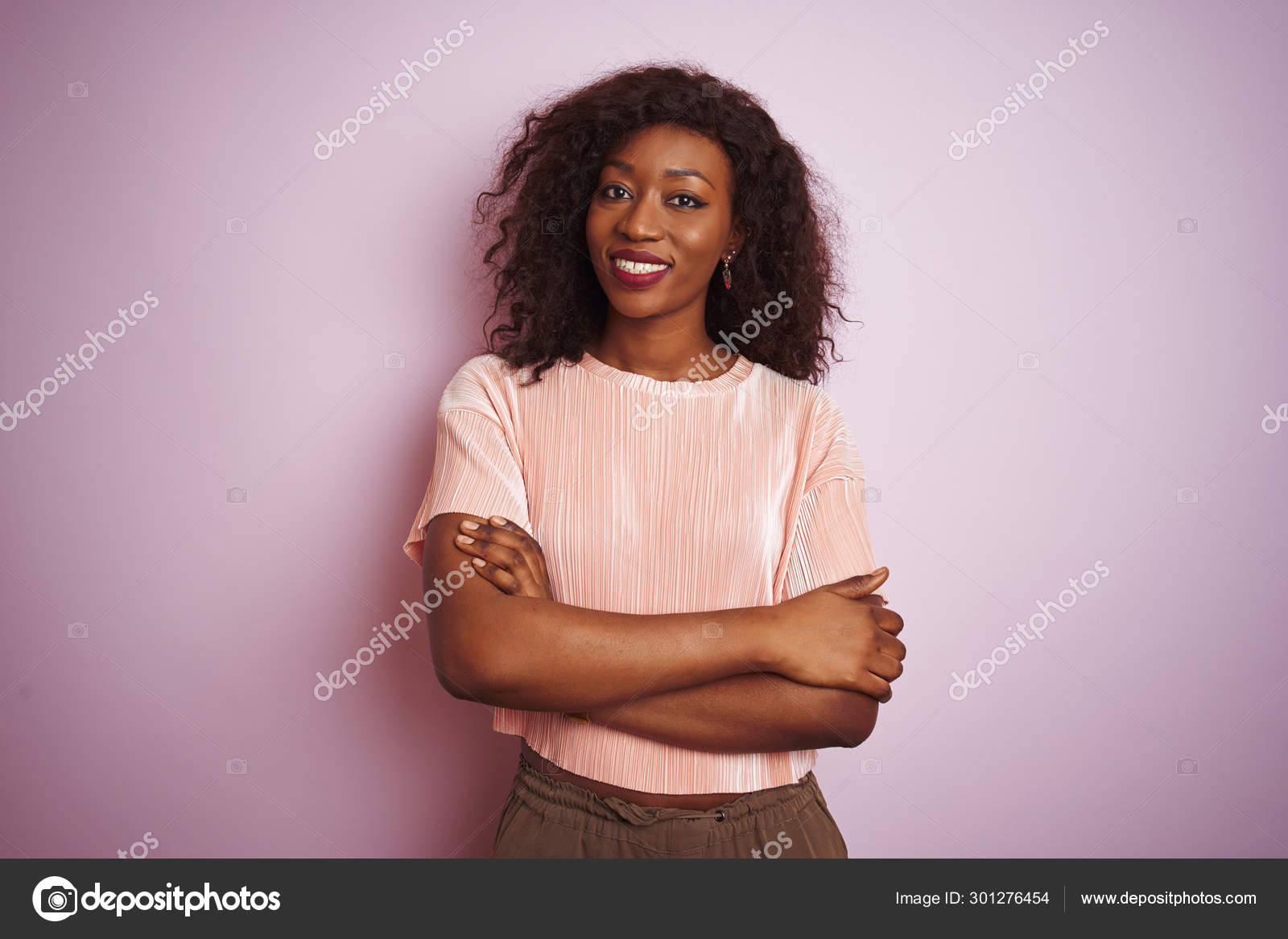 Young African American Woman Wearing Shirt Standing Isolated Pink  Background Stock Photo by ©Krakenimages.com 301276454