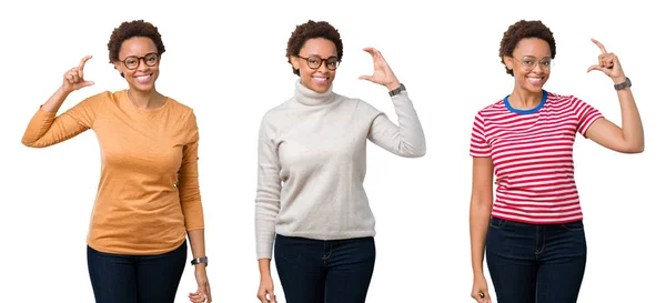 年轻的非洲裔美国妇女戴着眼镜 面带微笑 自信地用手做尺寸标志 同时看着和相机 测量概念 — 图库照片