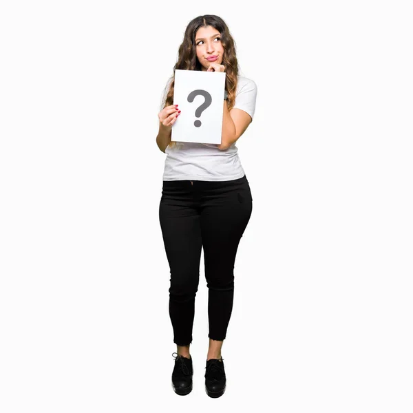 Young Adult Woman Holding Paper Question Mark Serious Face Thinking — Stock Photo, Image