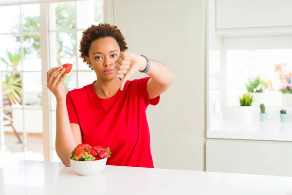 Young African American Woman Eating Fresh Strawberries Breakfast Angry Face — Stock Photo, Image