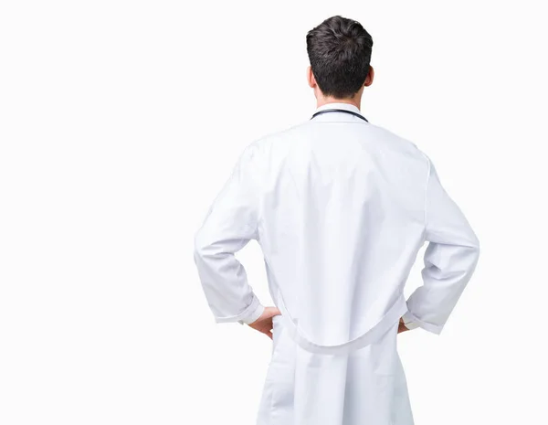 Young Doctor Man Wearing Hospital Coat Isolated Background Standing Backwards — Stock Photo, Image