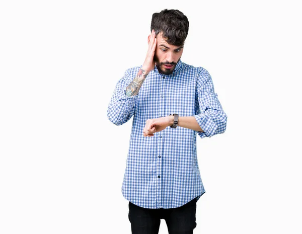 Joven Hombre Negocios Guapo Sobre Fondo Aislado Mirando Tiempo Reloj —  Fotos de Stock