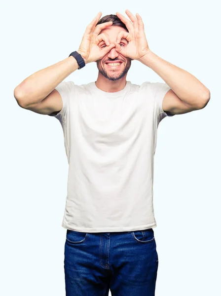 Handsome Man Wearing Casual White Shirt Doing Gesture Binoculars Sticking — Stock Photo, Image