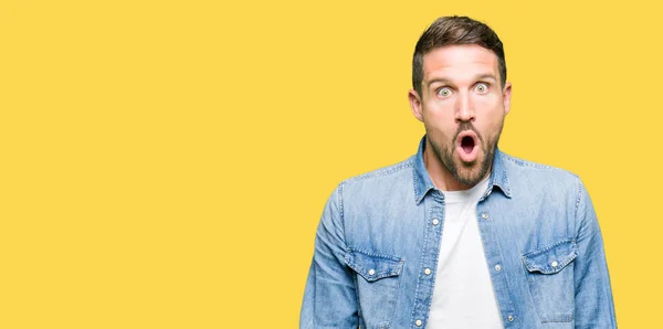 Handsome Man Blue Eyes Beard Wearing Denim Jacket Afraid Shocked — Stock Photo, Image