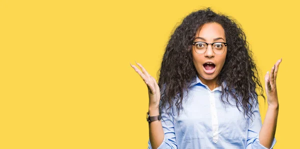 Young Beautiful Business Girl Curly Hair Wearing Glasses Crazy Mad — Stock Photo, Image
