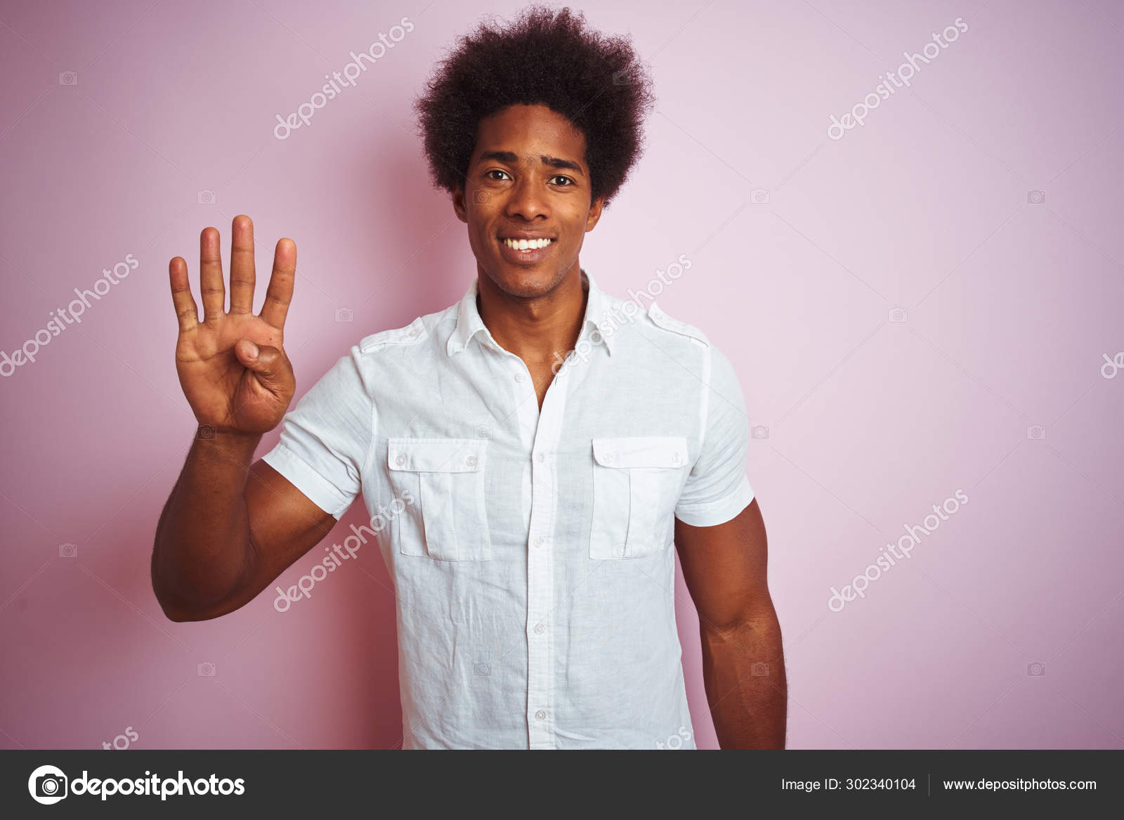 Young American Man Afro Hair Wearing White Shirt Standing Isolated