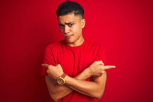 Young Brazilian Man Wearing Shirt Standing Isolated Red Background Pointing — Stock Photo, Image