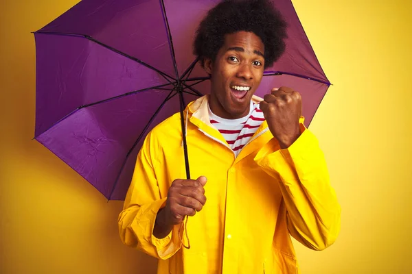 Afro American Man Wearing Rain Coat Umbrella Standing Isolated Yellow — Stock Photo, Image