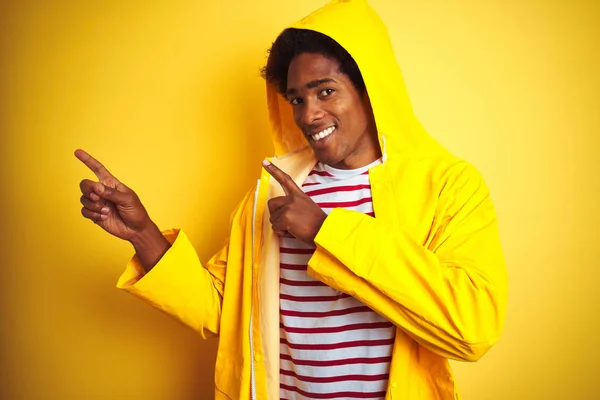 African Man Afro Hair Wearing Rain Coat Hood Standing Isolated — Stock Photo, Image