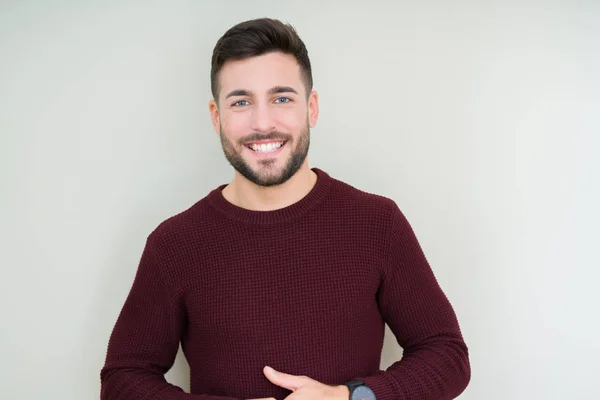 Junger Gutaussehender Mann Der Einen Pullover Über Isolierten Hintergrundhänden Trägt — Stockfoto