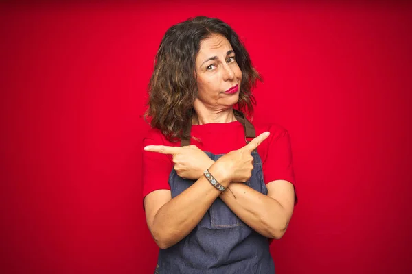 Middle Age Senior Woman Wearing Apron Uniform Red Isolated Background — Stock Photo, Image