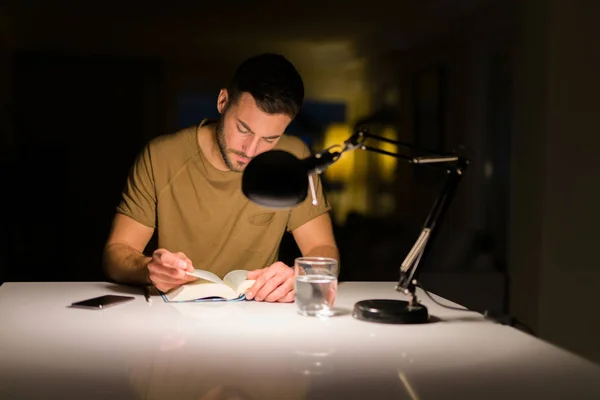 Young Handsome Man Studying Home Reading Book Night — Stock Photo, Image