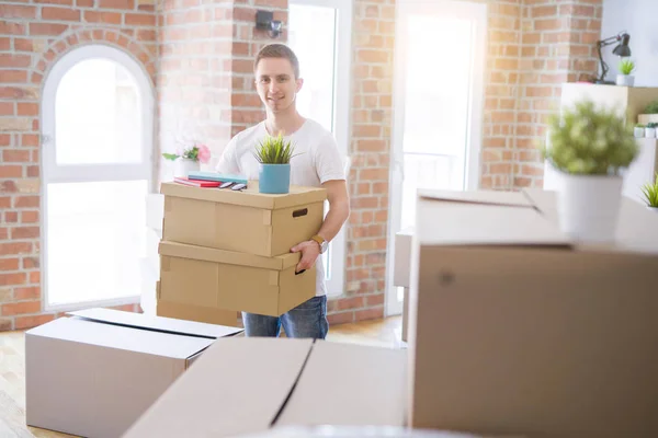 Handsome Young Man Smiling Happy Moving New Home Very Excited — Stock Photo, Image