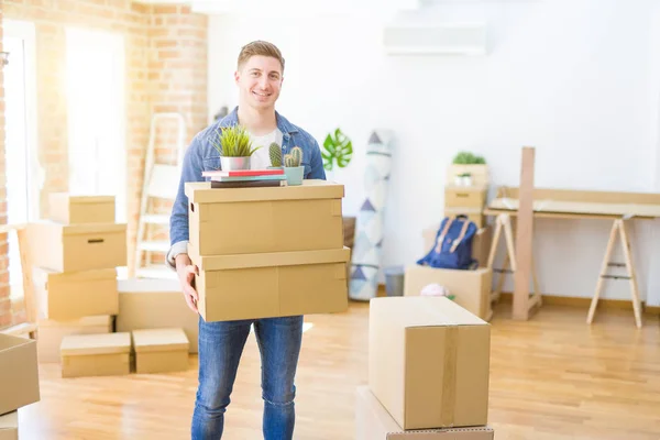 Handsome Young Man Smiling Happy Moving New Home Very Excited — Stock Photo, Image