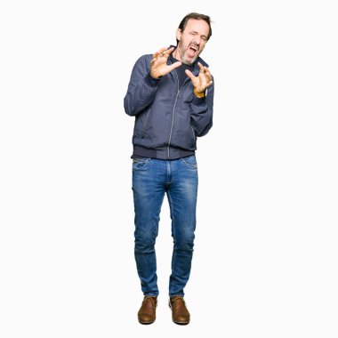 Bir ceket giyen orta yaş yakışıklı adam tiksinti ifadesi, memnun ve korkulu tiksinti yüz yapıyorsun çünkü nefret tepki. Elleriyle kaldırdı. Sinir bozucu kavramı.