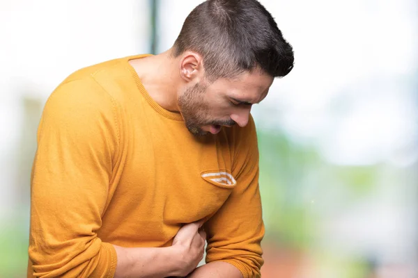 Joven Hombre Guapo Sobre Fondo Aislado Con Mano Estómago Porque — Foto de Stock