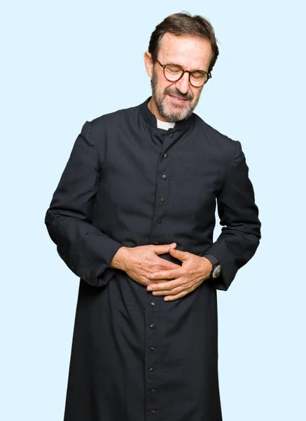 Sacerdote Mediana Edad Vestido Con Bata Católica Con Mano Estómago —  Fotos de Stock