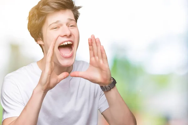 Junger Gutaussehender Mann Lässigem Weißem Shirt Vor Isoliertem Hintergrund Der — Stockfoto