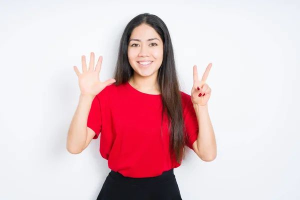 Schöne Brünette Frau Trägt Rotes Shirt Über Isoliertem Hintergrund Und — Stockfoto