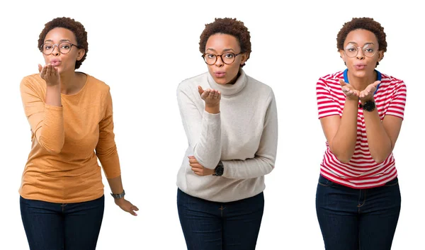 Молодая Африканская Американка Афроволосами Очках Смотрящая Камеру Дуя Камеру Целует — стоковое фото