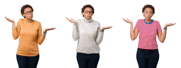 Mujer Afroamericana Joven Con Pelo Afro Usando Gafas Expresión Despistada —  Fotos de Stock