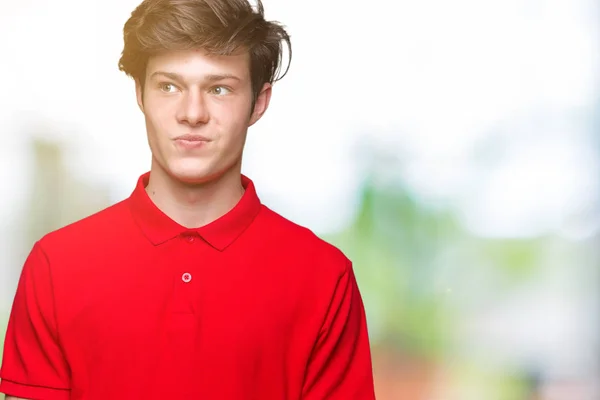 Junger Gutaussehender Mann Der Rotes Shirt Über Isoliertem Hintergrund Trägt — Stockfoto