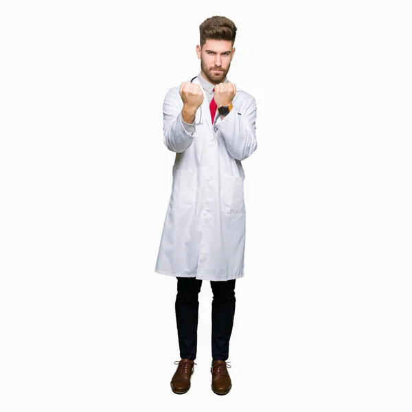 Young Handsome Doctor Man Wearing Medical Coat Ready Fight Fist — Stock Photo, Image