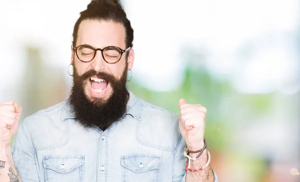 Young Hipster Man Long Hair Beard Wearing Glasses Excited Success — Stock Photo, Image