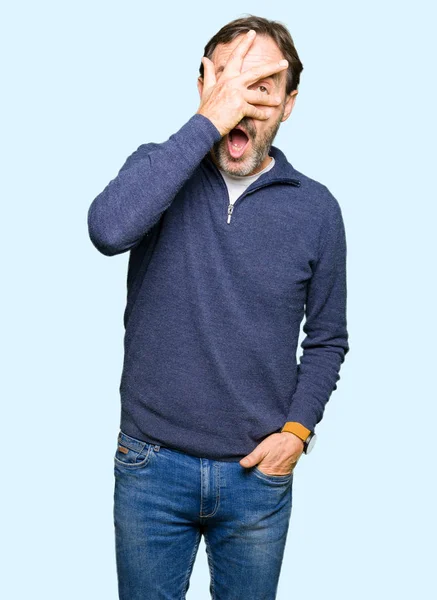 Middle Age Handsome Man Wearing Sweater Peeking Shock Covering Face — Stock Photo, Image