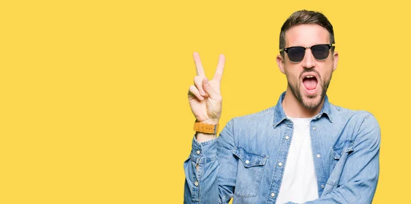 Handsome Man Wearing Fashion Sunglasses Smiling Happy Face Winking Camera — Stock Photo, Image