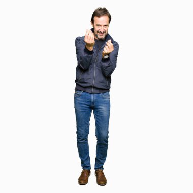 Maaş ödeme için milyoner iş soran bir ceket yapmak para hareketi el ile giyen orta yaş yakışıklı adam