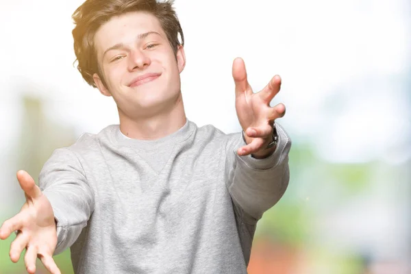 Knappe Sportieve Jongeman Dragen Sweatshirt Geïsoleerde Achtergrond Kijken Naar Camera — Stockfoto