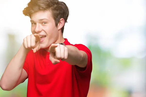 Jonge Knappe Man Met Rode Shirt Geïsoleerde Achtergrond Pointing Aan — Stockfoto