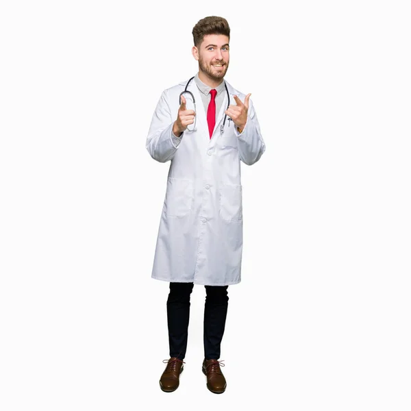 Young Handsome Doctor Man Wearing Medical Coat Pointing Fingers Camera — Stock Photo, Image