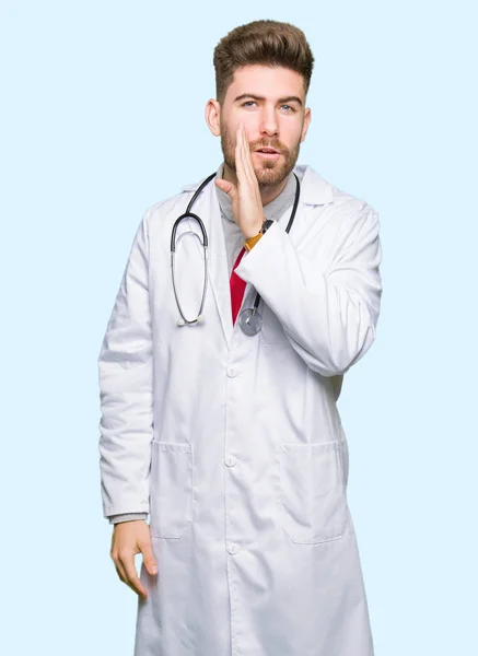 Young Handsome Doctor Man Wearing Medical Coat Hand Mouth Telling — Stock Photo, Image