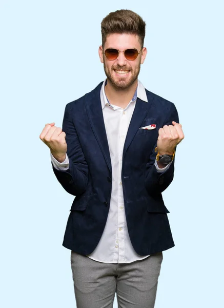 Young Handsome Elegant Man Wearing Sunglasses Fashion Blazer Celebrating Surprised — Stock Photo, Image