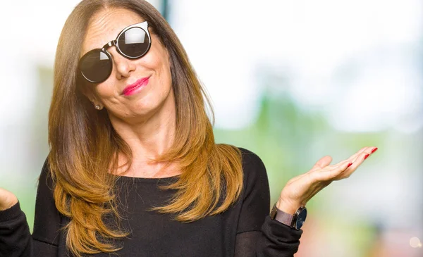Beautiful Middle Age Woman Wearing Sunglasses Clueless Confused Expression Arms — Stock Photo, Image