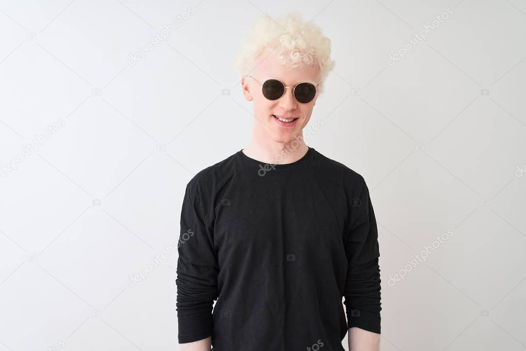 Young albino man wearing black t-shirt and sunglasess standing over isolated white background with a happy and cool smile on face. Lucky person.