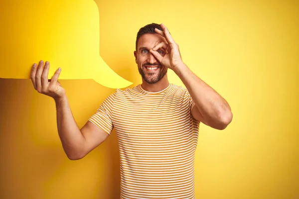 Young Man Holding Empty Speech Bubble Message Yellow Isolated Background — Stock Photo, Image