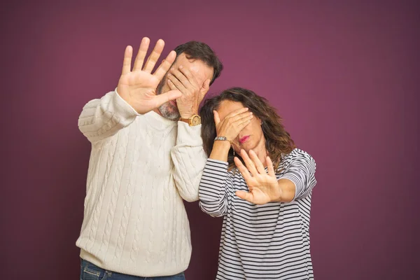 Beautiful Middle Age Couple Wearing Winter Sweater Isolated Purple Background — Zdjęcie stockowe