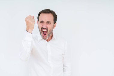 Öfkeli ve sinirli sinirli ve öfke ile bağırarak süre öfkeli yumruk yükselterek izole arka plan üzerinde zarif komuta sizde. Öfke ve agresif kavramı.