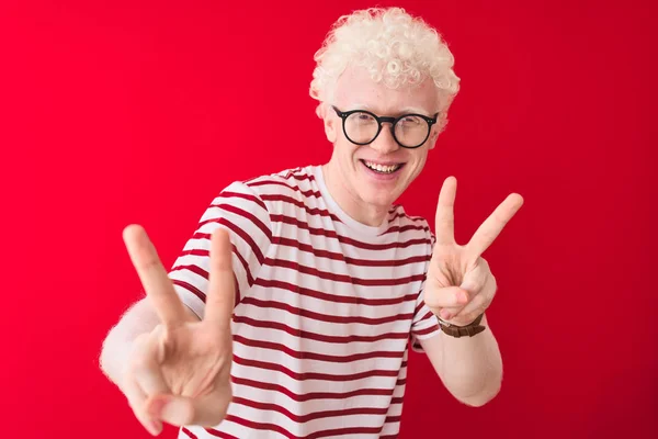 Young Albino Blond Man Wearing Striped Shirt Glasses Isolated Red — Stock Photo, Image