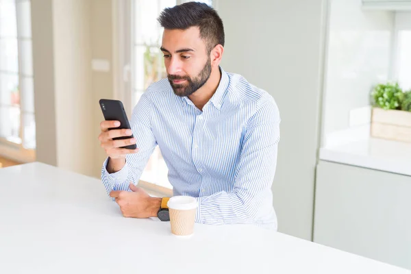 Handsome Hispanic Business Man Drinking Coffee Using Smartphone Confident Expression — Stock Photo, Image