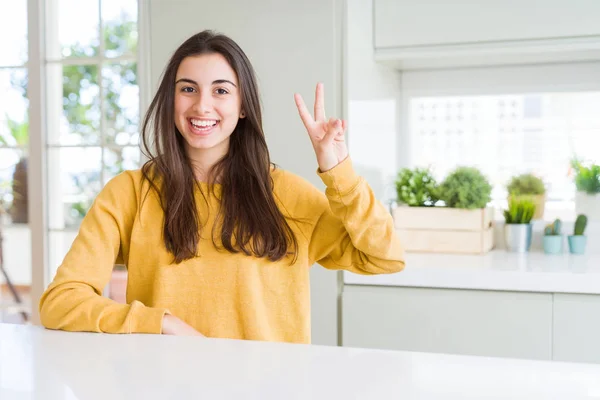 Beautiful Young Woman Wearing Yellow Sweater Showing Pointing Fingers Number — Stock Photo, Image