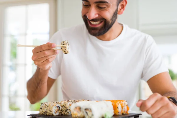 Handsome Man Smiling Happy Enjoying Eating Fresh Colorful Asian Sushi — Stock Photo, Image