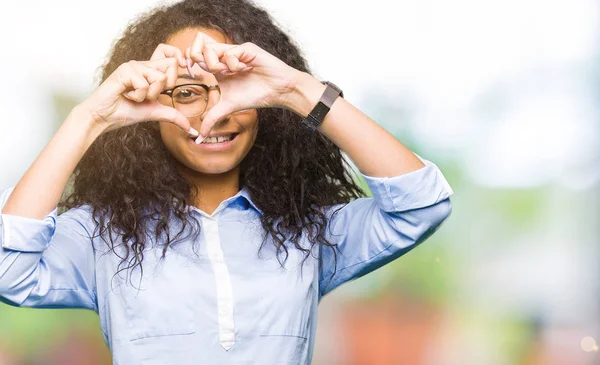 Young Beautiful Business Girl Curly Hair Wearing Glasses Doing Heart — Stock Photo, Image