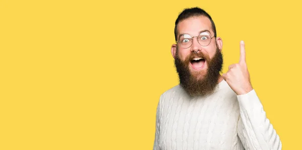 Young Hipster Man Wearing Glasses Winter Sweater Pointing Finger Successful — Stock Photo, Image