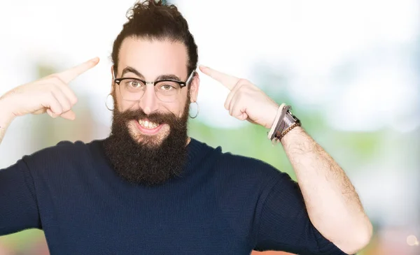 Young Hipster Man Long Hair Beard Wearing Glasses Smiling Pointing — Stock Photo, Image